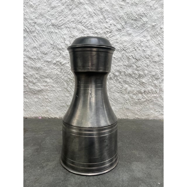 Pewter tappit hen flagon manufactured by Samuel Duncomb, London. Remnants of the makers mark is located on the bottom of...