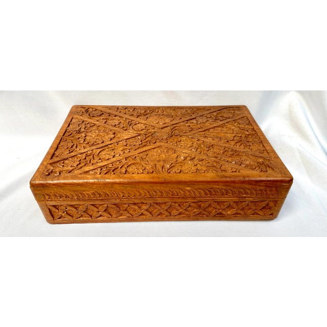 Imported from India. Hand carved wood box. Beautiful decorative accessory. Tight fit to insure freshness. Not just for...