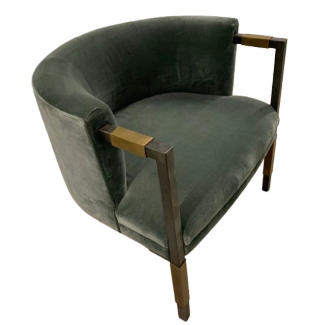 - The elegant and soulful Larchmont chair features pewter patina legs sheeted in burnished bronze. - The softly rounded...