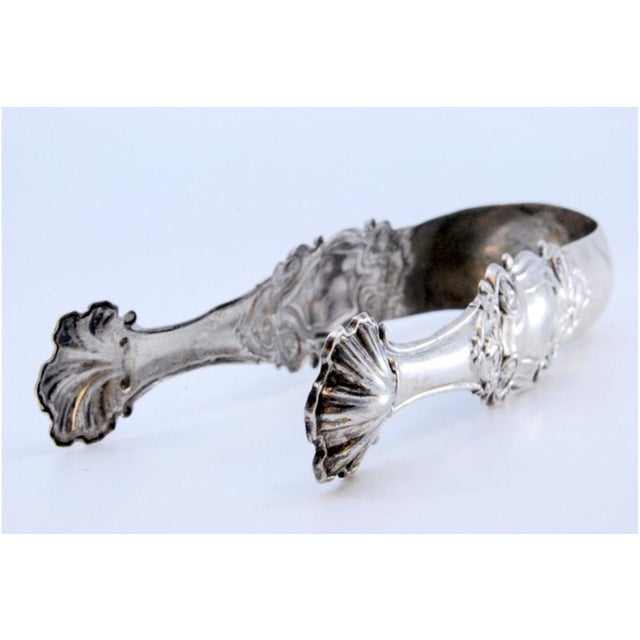 Silver Ice Tongs with Reliefs and Application on the Stem, in Good conditions. Designed 1920 to 1949