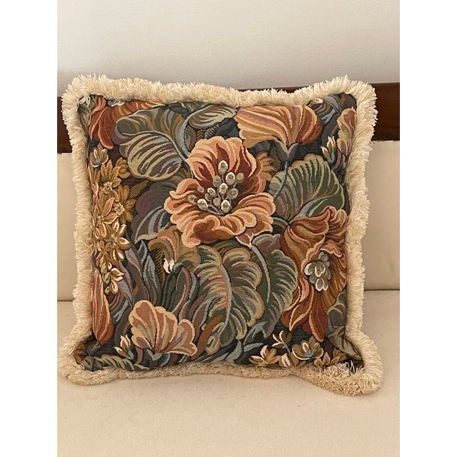 Vintage tapestry pillow with floral design and fluffy fringes. Great condition.