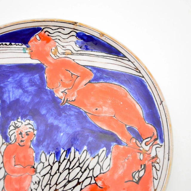 Dish with decoration representing a group of women in a field of prickly pears. Almost certainly of Sicilian ceramic, the...