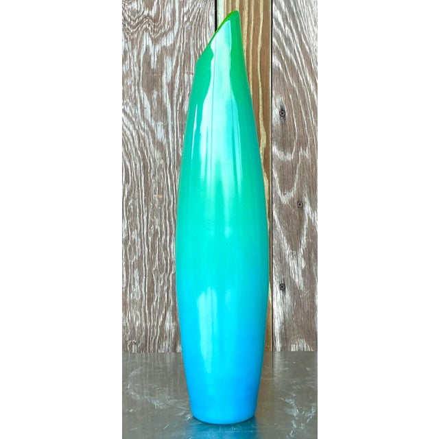Discover the allure of this vintage Boho signed art glass vase. Combining organic Bohemian charm with the artistic...