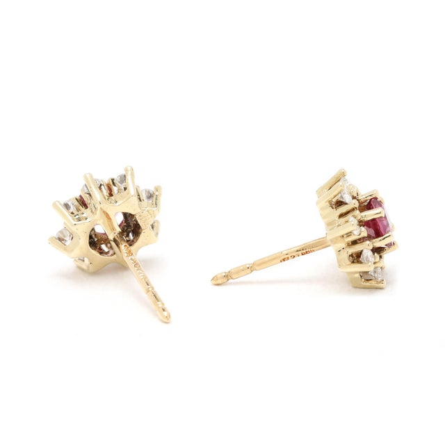 Stones: ruby, 2 round 4 mm .70ctw diamond, 16 round brilliant cut 1.5 mm .25ctw GH color/ SI1-2 clarity Length: 7.4 mm...