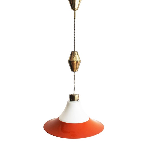 This is a striking adjustable ceiling light from 1960s Czechoslovakia. A fine example of mid-century ingenuity, this...