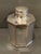 Silverplate tea caddy by the Paul Revere Silver Company of Boston. Round loose fitting lid with applied decorative border...