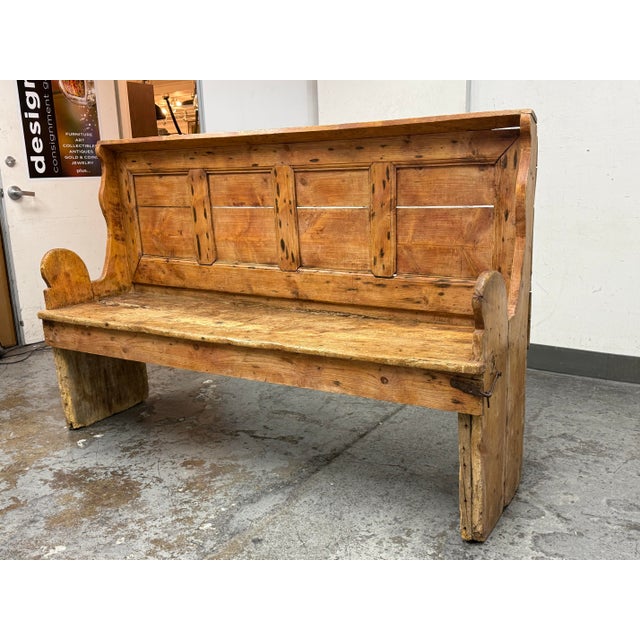 Design Plus Gallery presents an English Pine Settle Bench from the Late 19th Century. This rustic bench is made from solid...