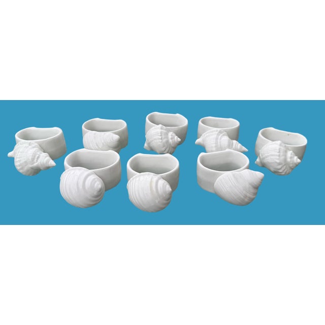 Set of 8 seashell napkin rings in excellent condition.