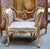 Make a statement with this beautifully ornate French-inspired accent chair, featuring an intricately carved frame finished...