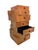 This very rare miniature drawer unit is made of walnut veneer. It is a small box-like structure with seven staggered...