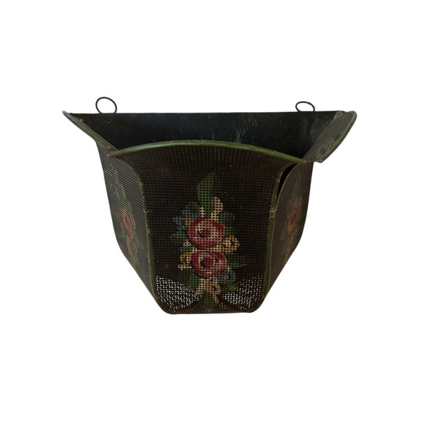 Beautiful hand painted wire wall pocket. It can be used for a plant or a mail holder. it is black with red, yellow and...