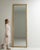 This piece presents as a mirror, distinguished by gold gilt slim frame, tall floor mirror. Originating in France during...