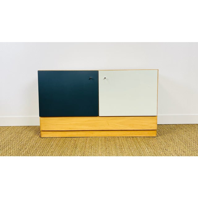 Vintage sideboard, low side table dating from the 1960s, featuring two storage doors and a drawer. Doors painted white and...