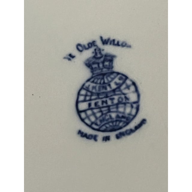 Blue and white Willow ware plates made in England. A set of four.