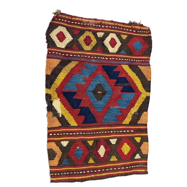 This Antique and Rare small Tribal Caucasian Kuba Kilim stands at 2' by 1'41" 25" h by 17" w) and dates back to the late...