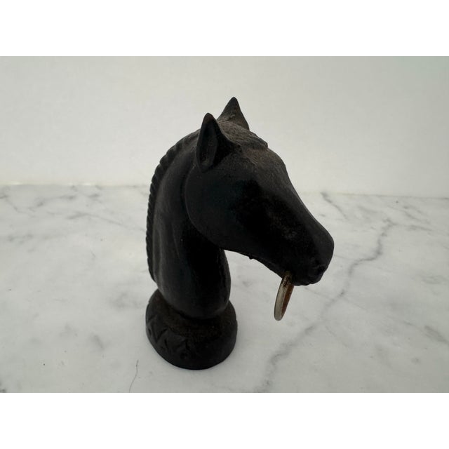 Horse paperweight in black wrought iron with a horse bit in brass. For the equestrian in your life.