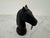 Horse paperweight in black wrought iron with a horse bit in brass. For the equestrian in your life.