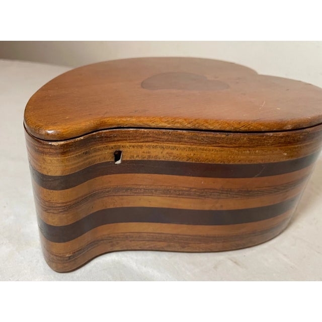 Up for sale is a very nice quality antique 19th century handmade parquetry wooden heart shaped dresser box. The piece has...