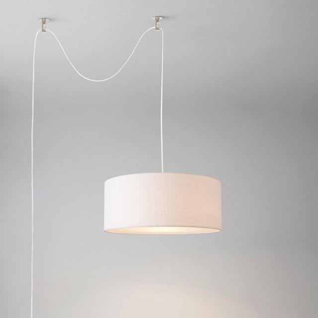 Featuring an iconic Swaghitectural silhouette, the Stretch 15" Swag Lamp is a statement piece designed to enhance any room...