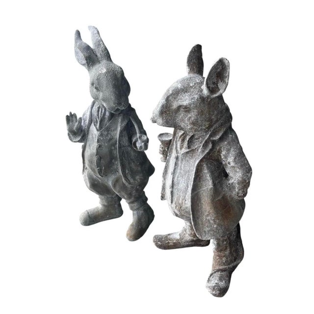 Bring timeless storybook charm to your home or garden with this delightful pair of dapper gentleman rabbit statues....