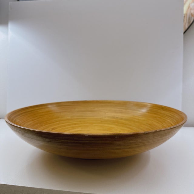 Bring warmth and natural beauty to your home with this stunning vintage extra large bamboo serving bowl. Expertly hand...