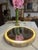 This Italian mirror from the 1960s is crafted in lacquered wood by Italian artist and designer Piero Fornasetti. The...