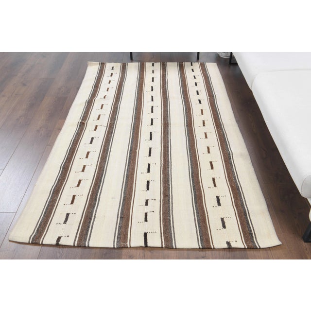 Vintage Turkish Hand-Knotted vintage rug is a semi-antique vintage kilim area rug.'70s Eastern region of Turkey's unique...