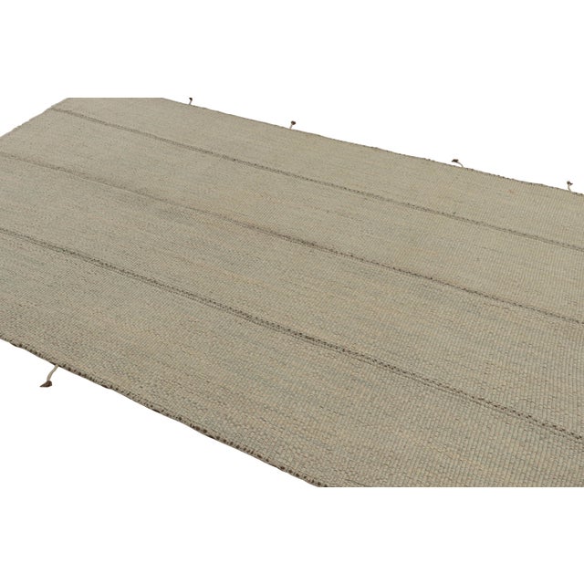 Handwoven in wool, a 7x10 Kilim design from an inventive new contemporary flat weave collection by Rug & Kilim. On the...