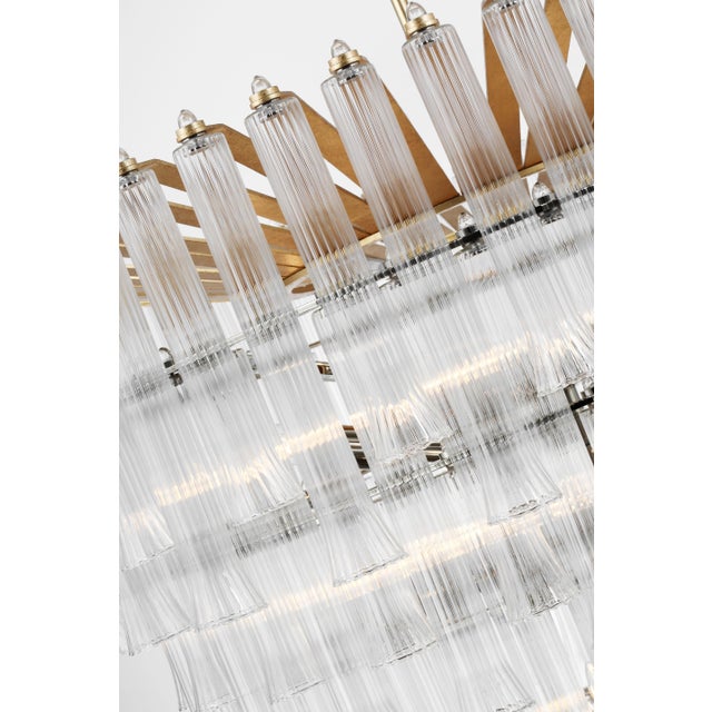 Lorelei X-Large Waterfall Chandelier in Gild with Clear Glass Designer: Julie Neill Canopy: 5.75" Round Mounting: Chain...