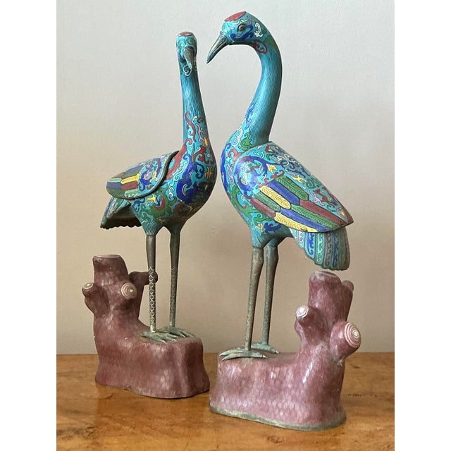 A truly magnificent pair of vintage Asian cranes, these statues are a masterful display of the ancient art of cloisonné....