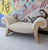 Large scroll-end upholstered bench / chaise / ottoman, USA 1980s. Bleached burr wood veneer; newly upholstered in ivory...