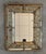 The square Venetian mirror has beveled panels and carved reliefs the mirror has been handmade and hand silvered. The...