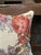 **Vintage, but never used** Charming vintage needlepoint pillow featuring a softly faded floral wreath composition in...