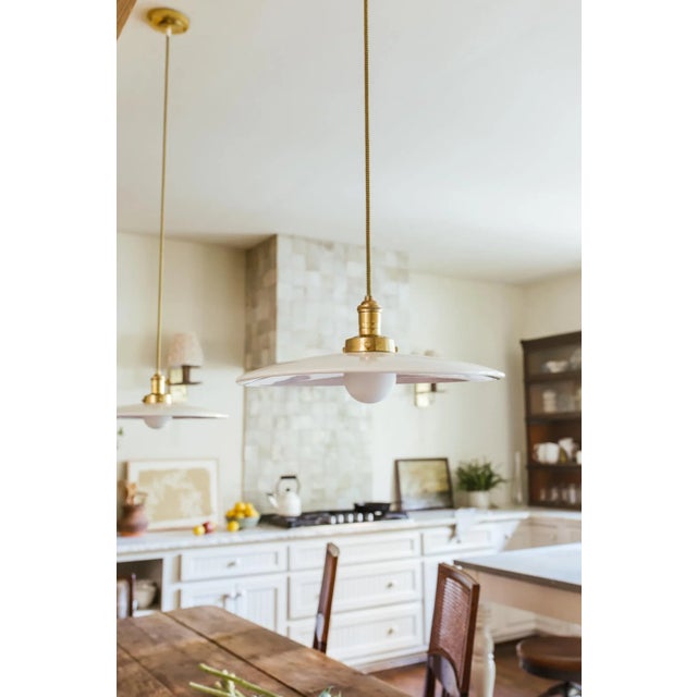 Add this wonderful pendant to your space. With a choice between copper or glass, this lighting fixture is as dynamic as...