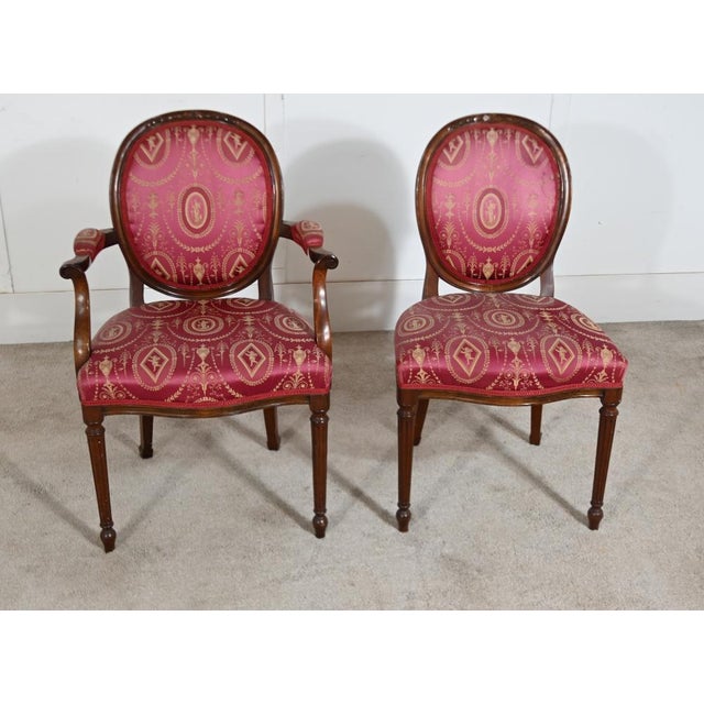 Fine set of eight mahogany dining chairs in the Regency Revival manner Dating to circa 1910 and comprising six side chairs...