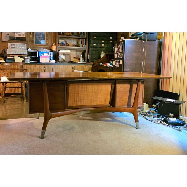 Striking Mid Century Modern walnut executive desk by Alma Desk Company from the coveted Skulptura series, made in High...