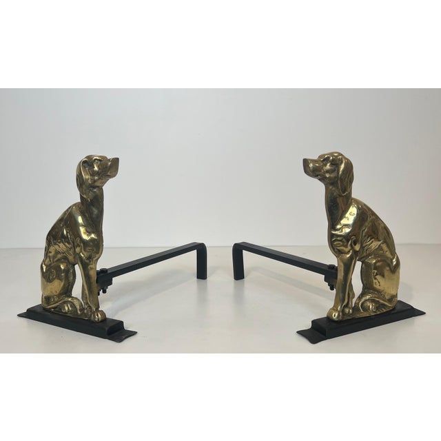 This beautiful pair of andirons is made of chiseled bronze. They depict stylized standing dogs. This is a French work from...