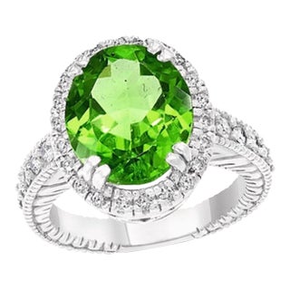 7 Carat Oval Peridot and 1.2 Carat Diamonds 14 Karat White Gold Cocktail Ring For Sale