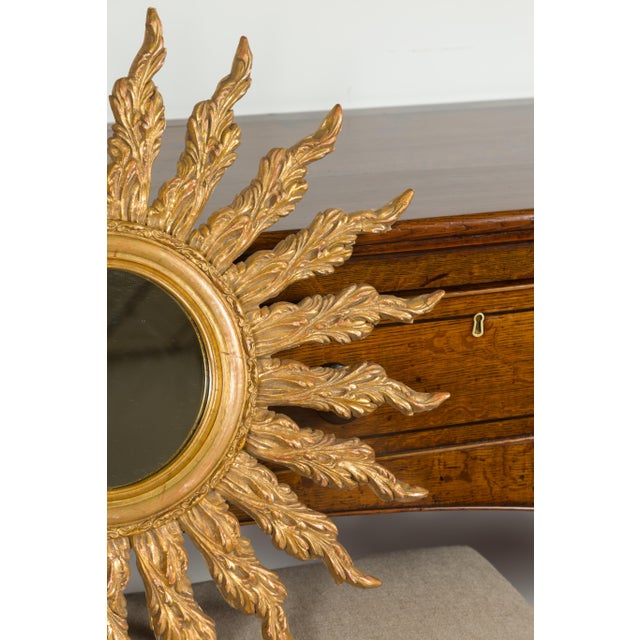 French Giltwood Sunburst Mirror with Wavy Sunrays from the Mid-20th Century For Sale - Image 9 of 11