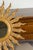 French Giltwood Sunburst Mirror with Wavy Sunrays from the Mid-20th Century For Sale - Image 9 of 11
