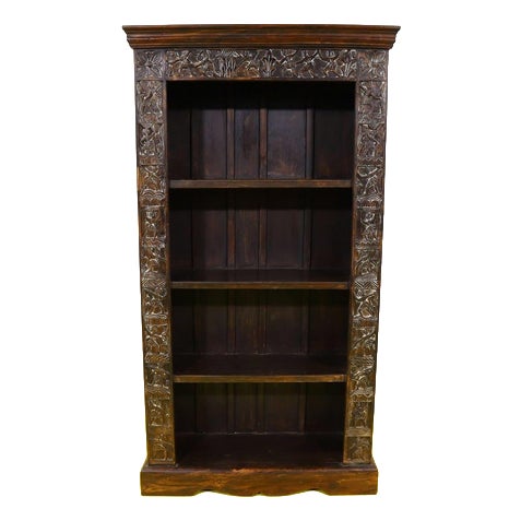 Carved Wooden Bookcase with Floral Motifs and Stylized Figures For Sale