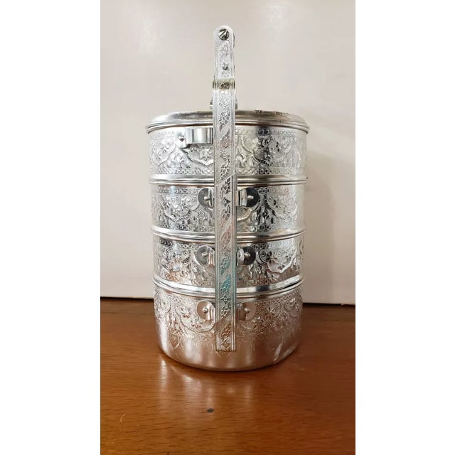 This is a Vintage Diamond Brand Aluminum Tiffin. It measures 15 1/2" high to the top of the handle and 9 1/2“ wide. The...