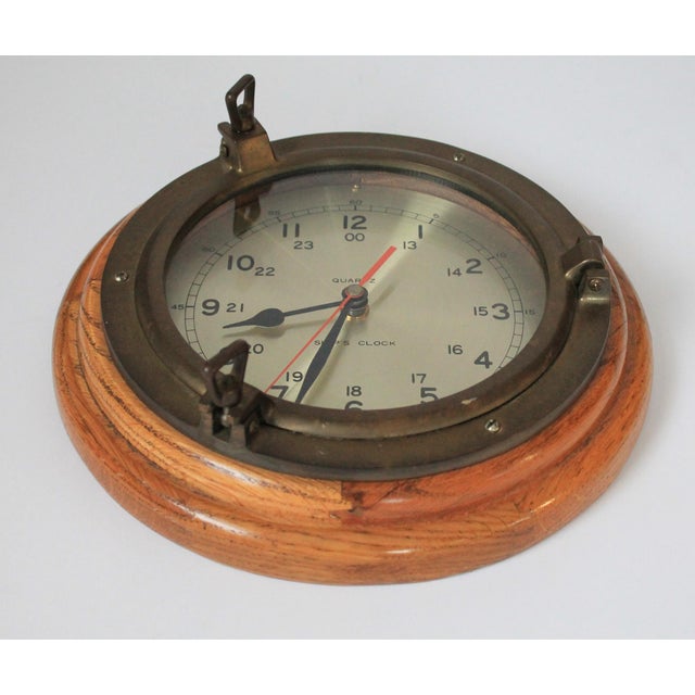 Nautical Vintage Brass and Wood Quartz Porthole Ship’s Clock For Sale - Image 3 of 9
