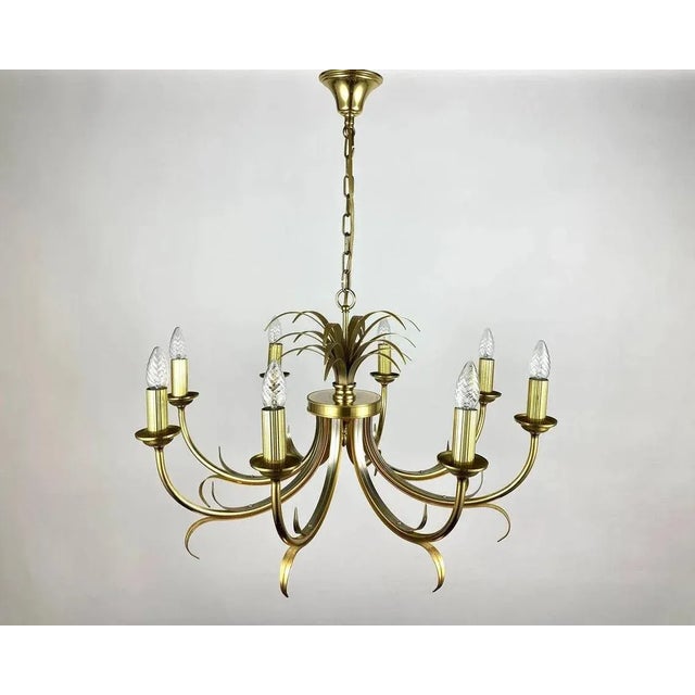 Gorgeous chandelier from s.a. Boulanger manufactory. belgium. maison bagues style. a large gilded tôle chandelier with a...