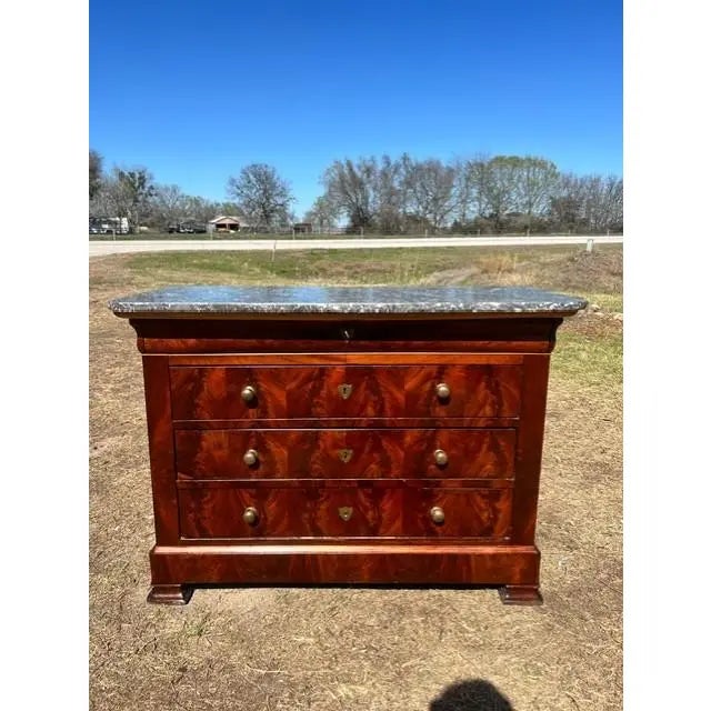 19th Century French Louis Philippe Commode from nice France. Made of Flam Mahogany, with a marble top, the wood has been...