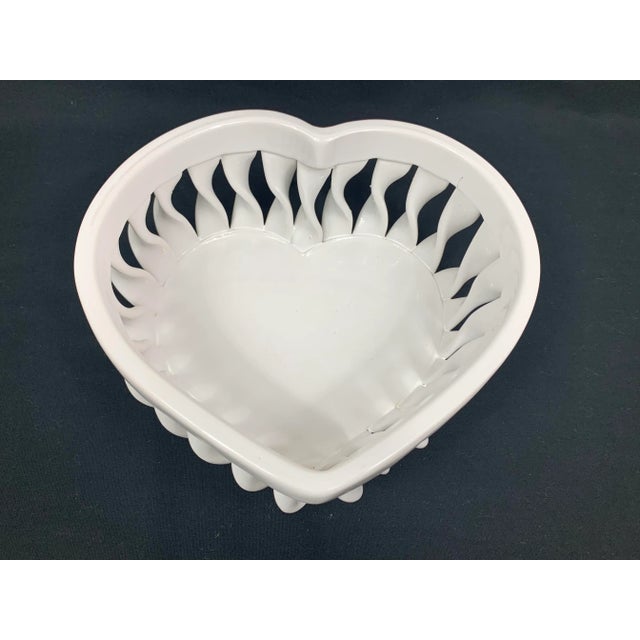 Lovely vintage bowl. Made in Italy. In the shape of a heart. Hand made. Ceramic. Perfect for display or to use with fruit....