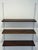 Vintage 1960s Mid-Century Modern wall shelving system in style of Kai Kristiansen, featuring richly grained rosewood...