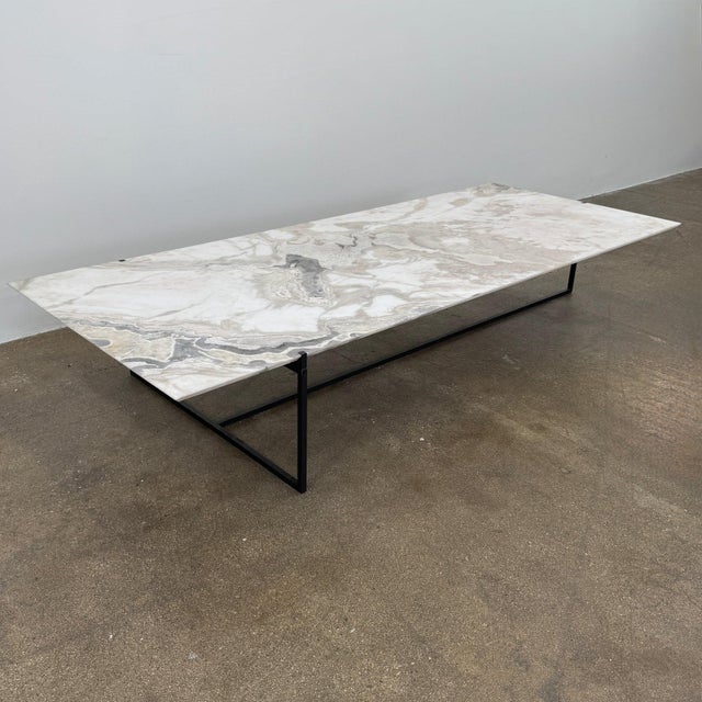 The Baxter Icaro brings together timeless elegance and practical performance. This table has a matte Polar White Marble...