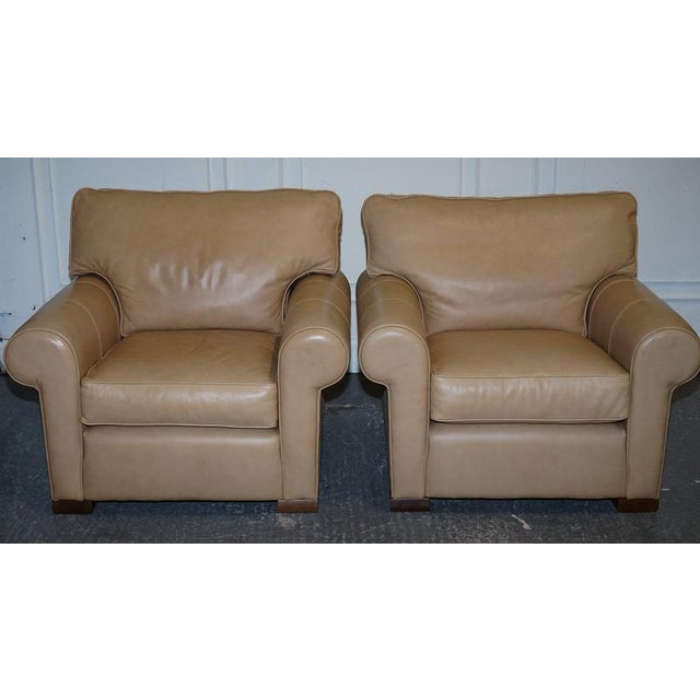 Fine Latte Brown Leather Pair of Armchairs by Multiyork England A fine pair of latte brown leather armchairs, made by...