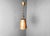 Vintage brutalist hammered copper sheet pendant light. The lamp emits a nice diffuse light thanks to the perforated shade....